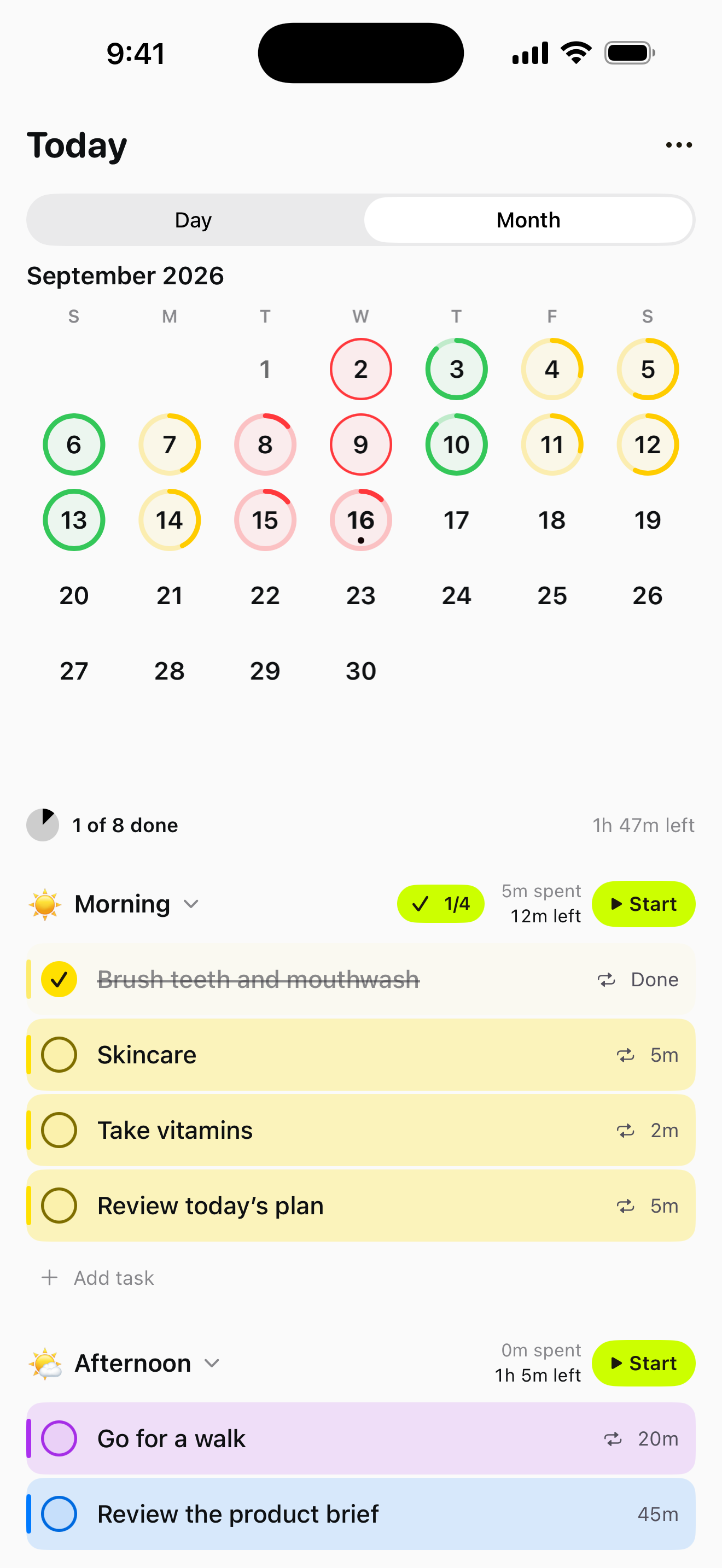 Tempo month calendar with red, yellow and green completion rings.